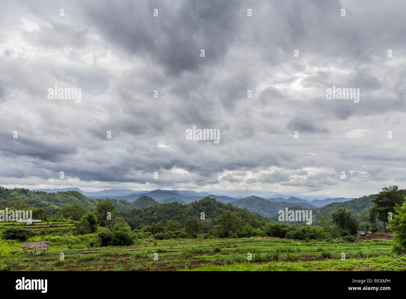 Dark storm clouds before rain over the mountains Stock Photo - Alamy