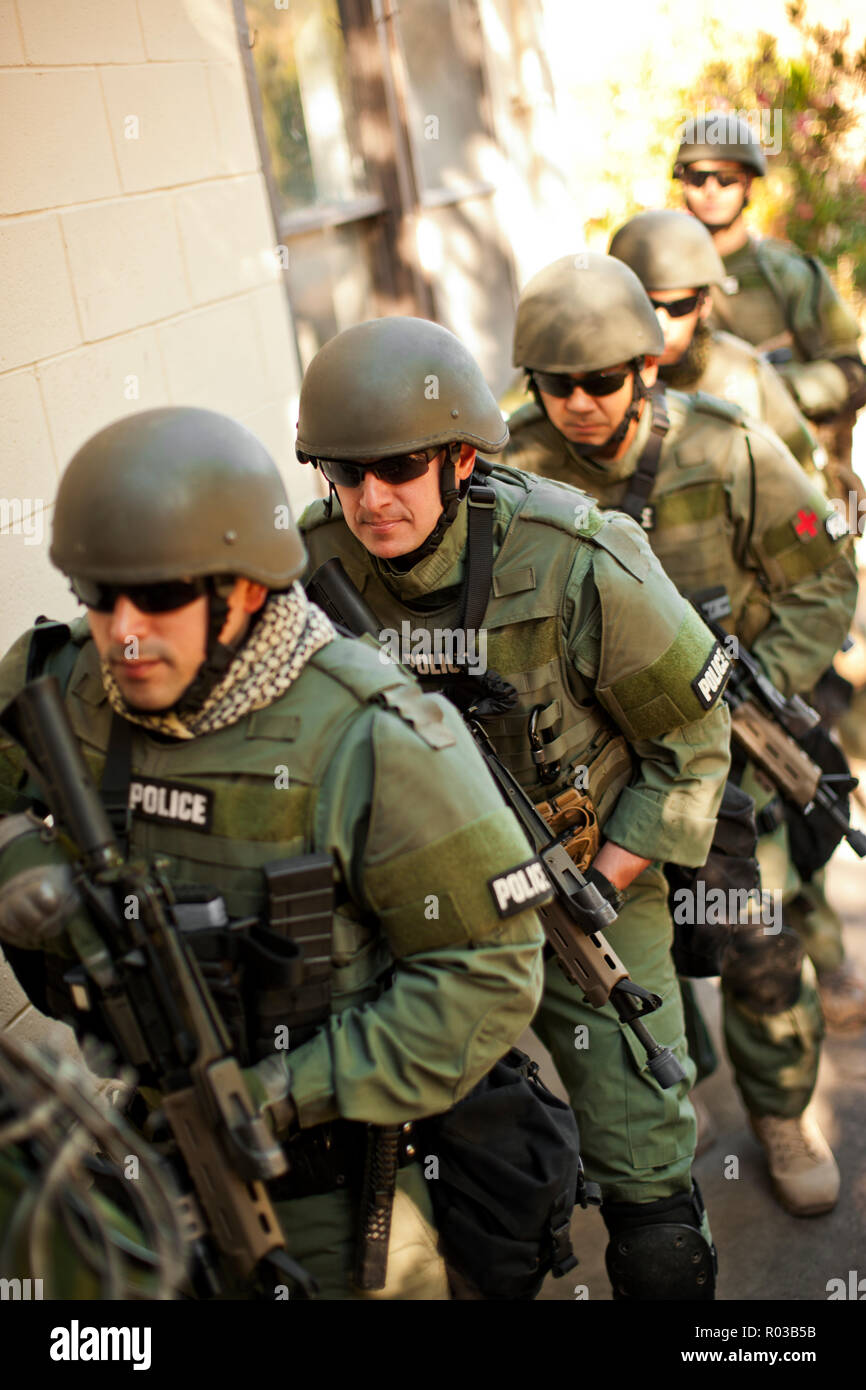 Holding rifle walking hires stock photography and images Alamy