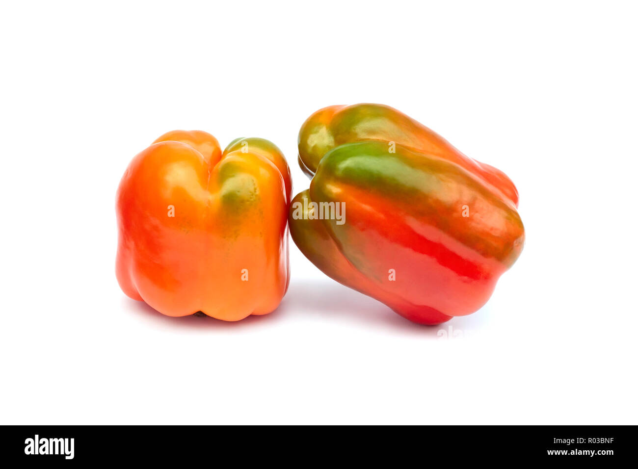 Two sweet pepper fruits on a white background Stock Photo Alamy