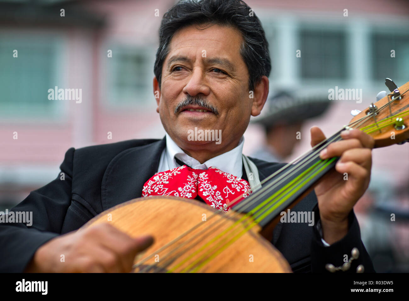 Mariachi musician playing guitar Stock Photo - Alamy