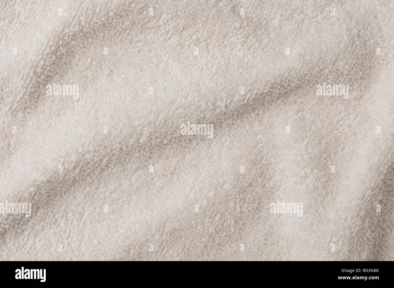 Fluffy clear brown towel top view, texture background Stock Photo
