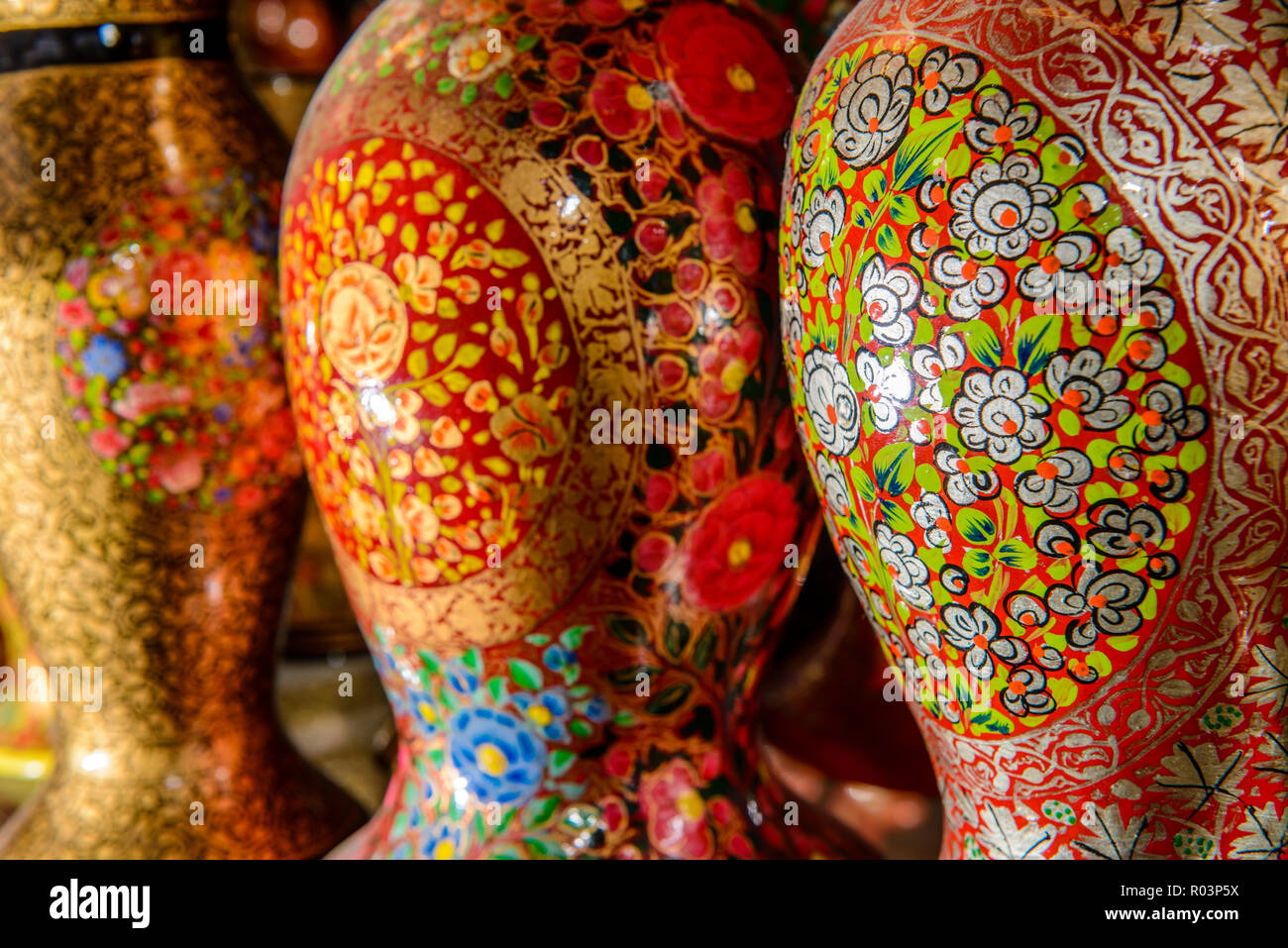 Paper mache is the material for many kashmiri souvenirs like vases, sold in little shops along Dal Lake Stock Photo