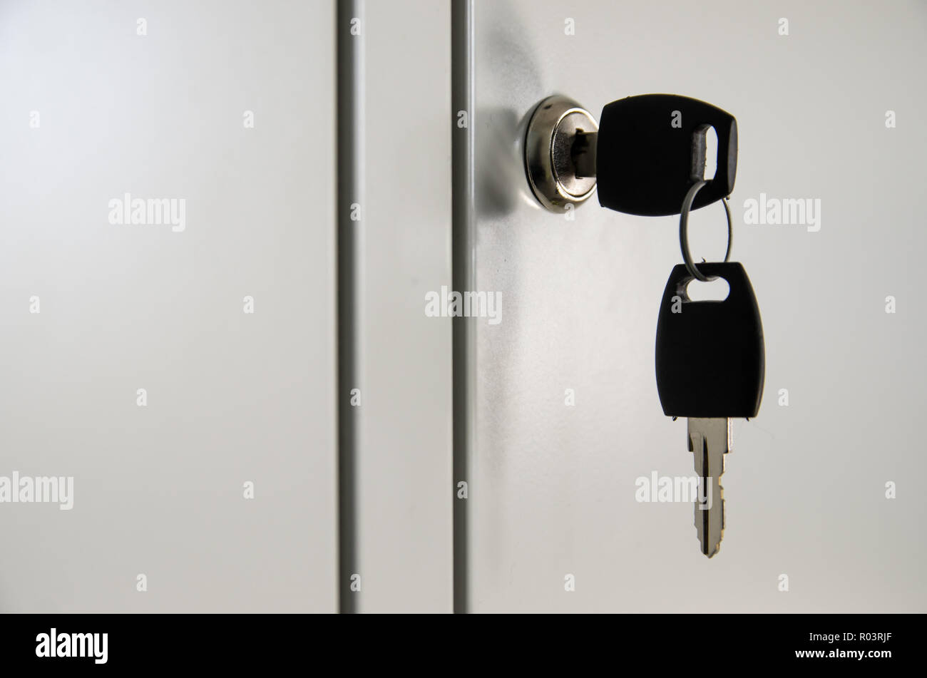 keys in the door of a private locker Stock Photo - Alamy