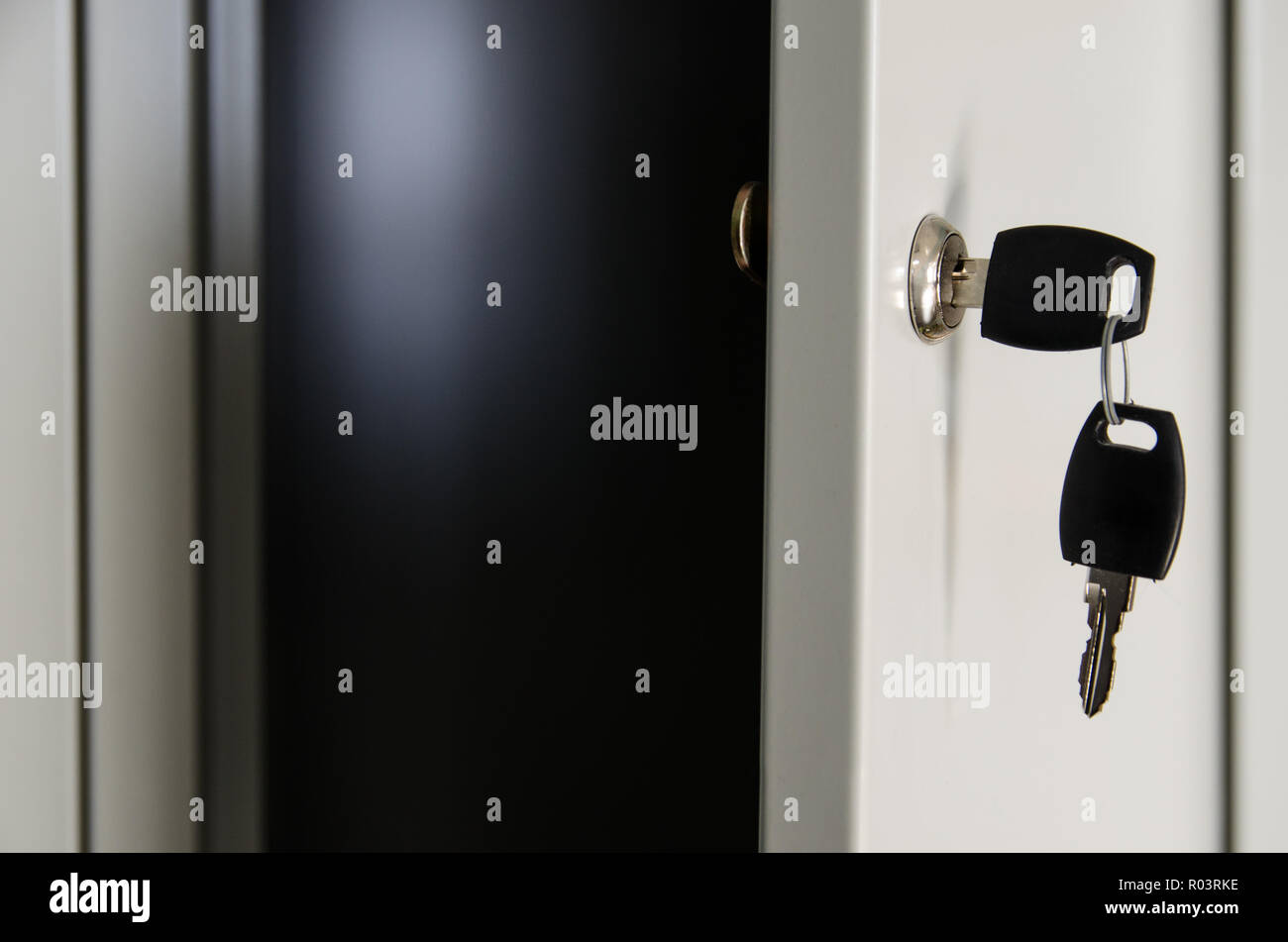 open locker with keys in the door Stock Photo - Alamy