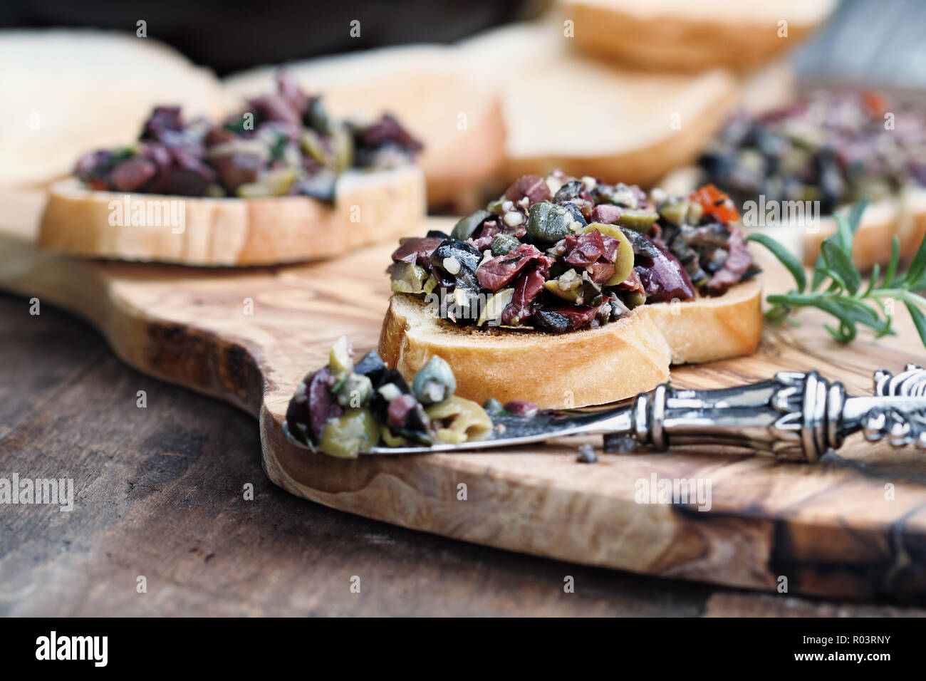 Homemade mixed Olive Tapenade made with garlic, capers, olive oil