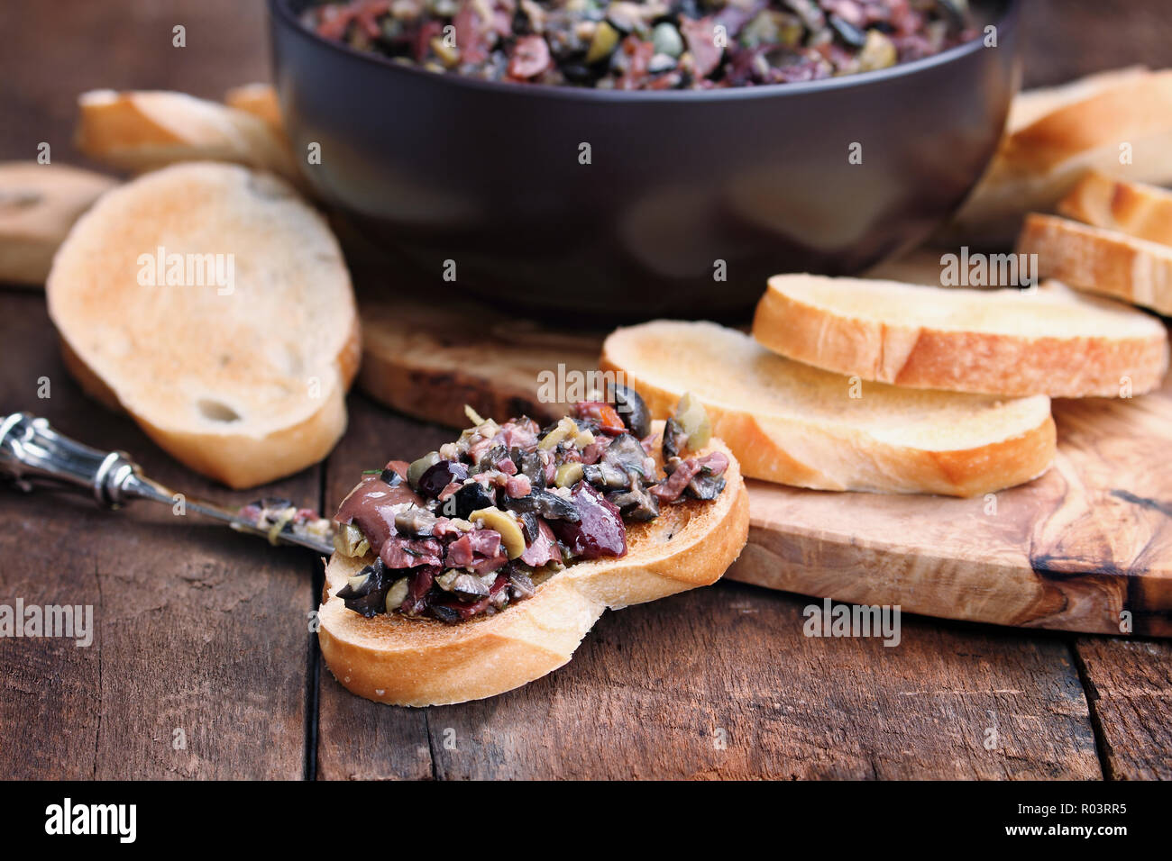 Homemade mixed Olive Tapenade made with garlic, capers, olive oil