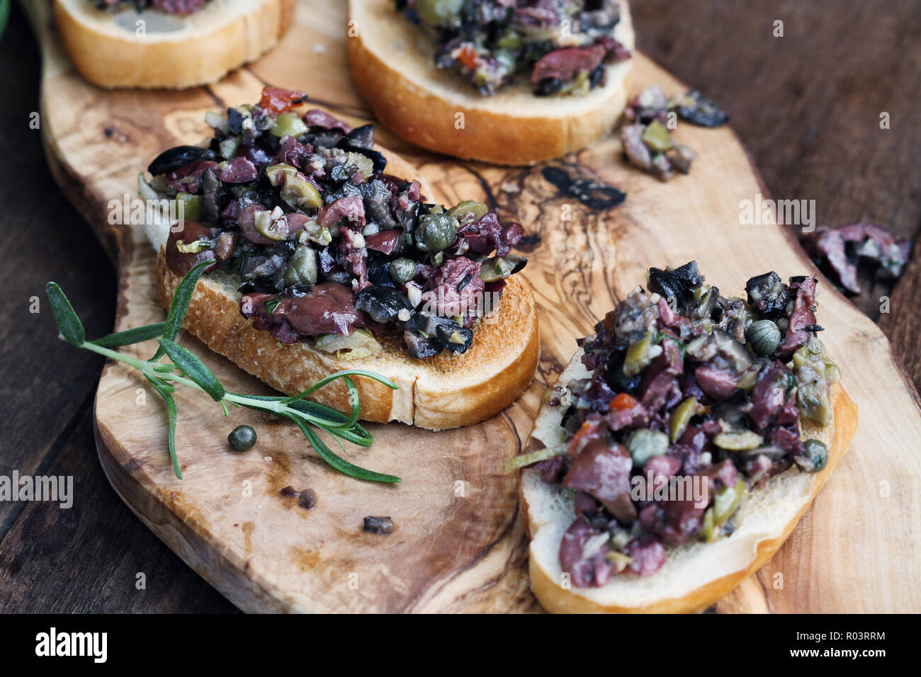 Homemade mixed Olive Tapenade made with garlic, capers, olive oil