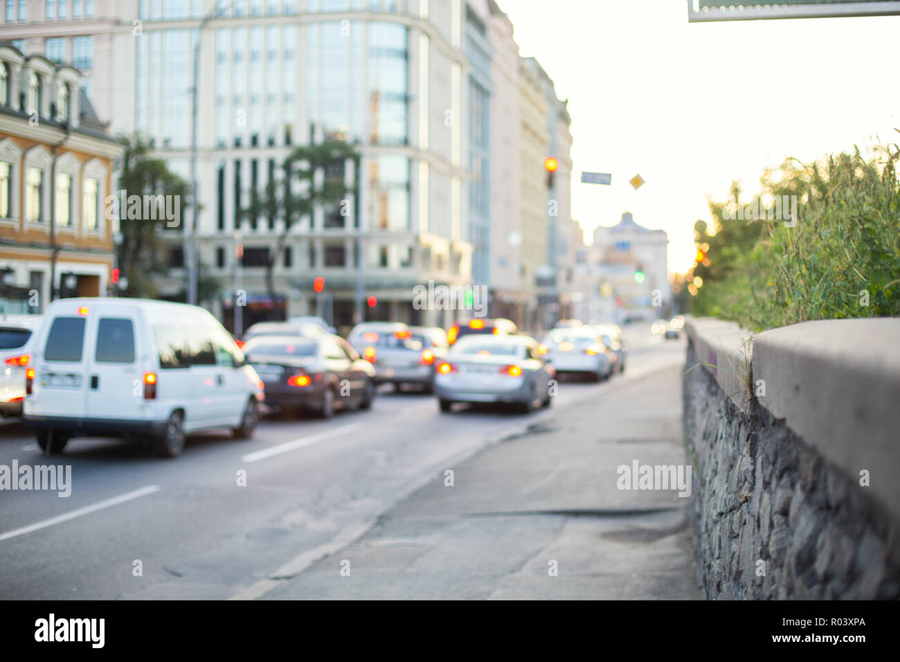 Blurred background with cars and buildings in the city. Stock Photo