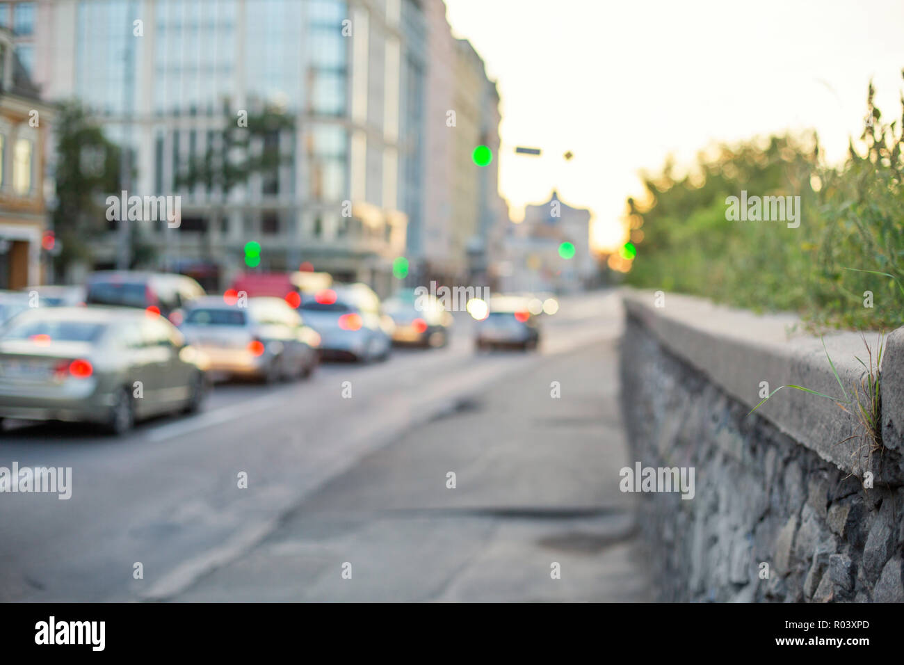 Blurred background with cars and buildings in the city. Stock Photo