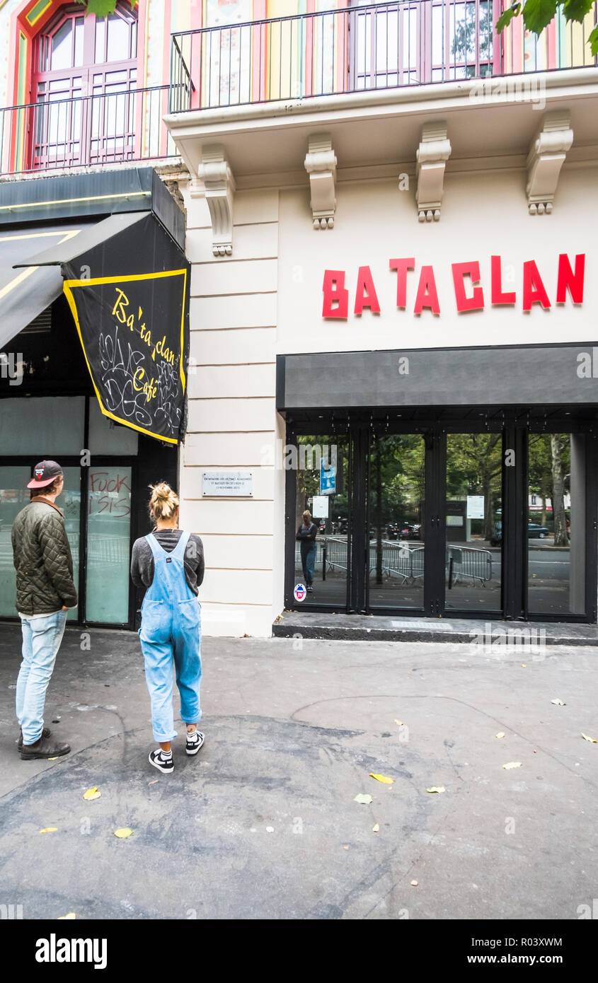 young couple looking at memorial plaque of bataclan terrorist attack Stock Photo