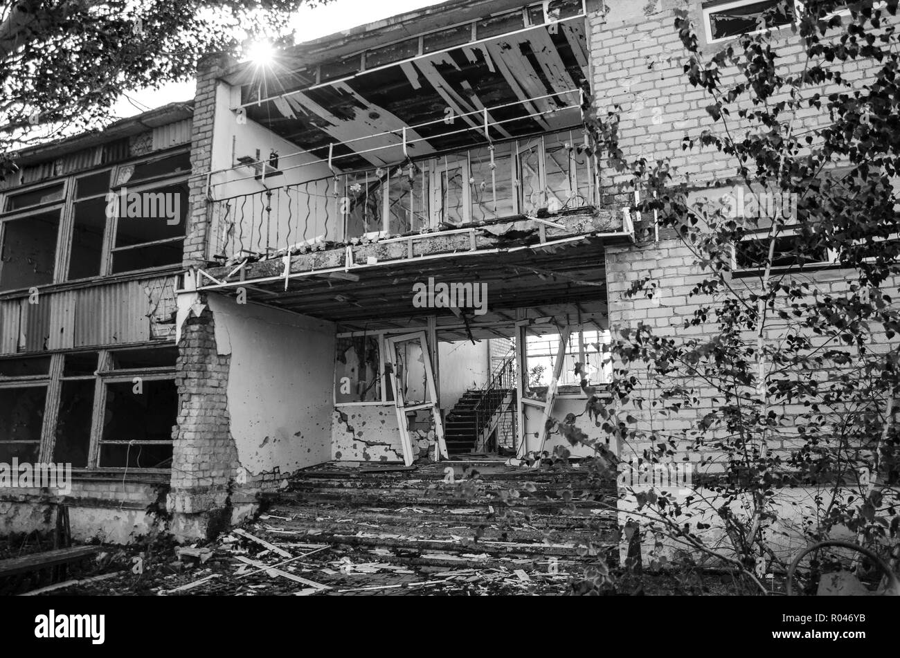 The war in Ukraine. Settlement Shyrokyne, Donetsk region. September 2018. Buildings destroyed as a result of military actions of the Russian invaders  Stock Photo