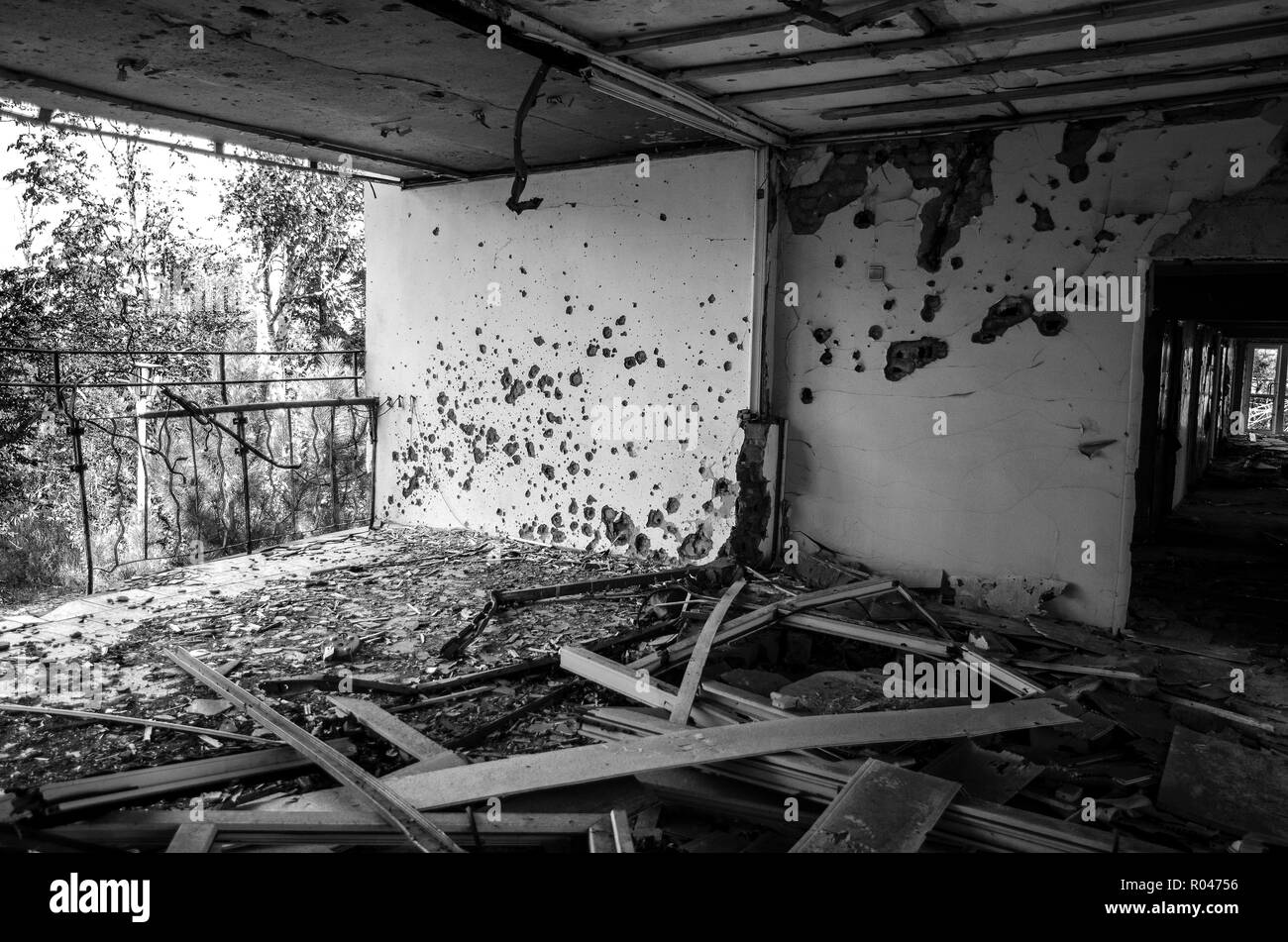 The war in Ukraine. Settlement Shyrokyne, Donetsk region. September 2018. Buildings destroyed as a result of military actions of the Russian invaders  Stock Photo