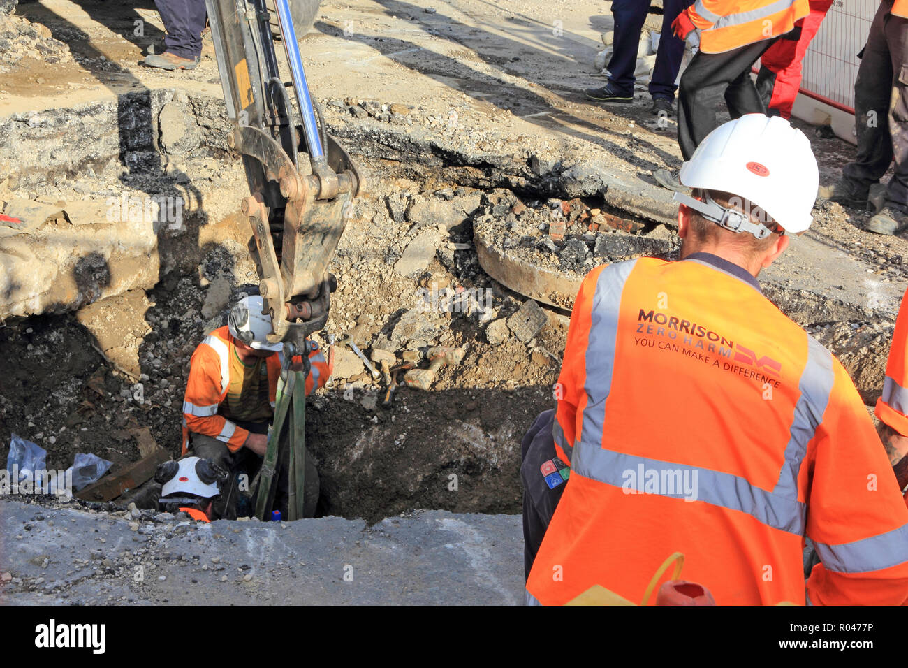 Workmen fixing water leak under road, Mytholmroyd (September 2018) Stock Photo