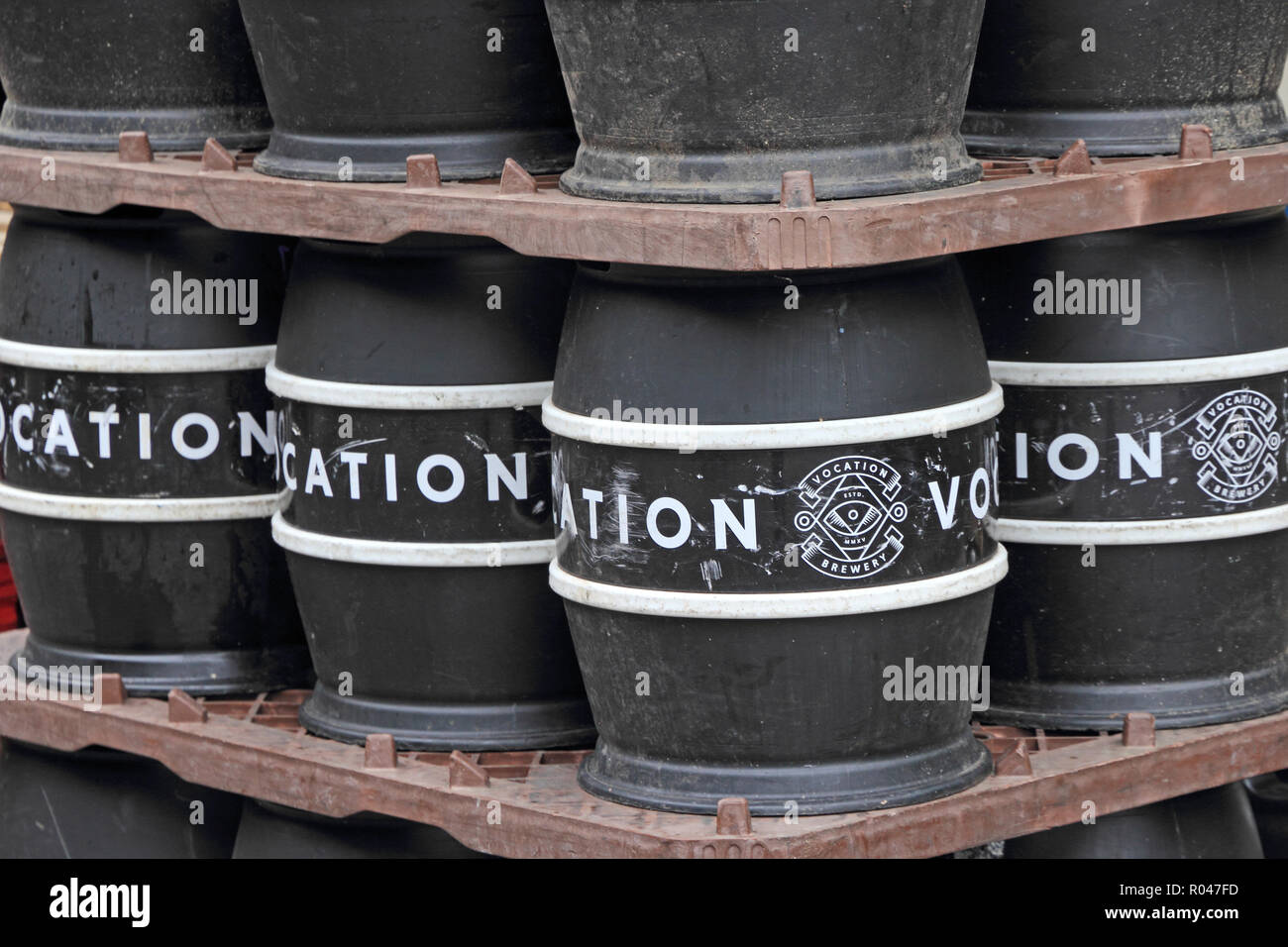 Empty Vocation Brewery beer kegs, stacked awaiting reuse Stock Photo
