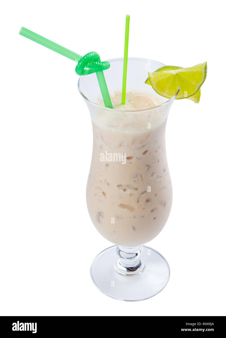 apple smoothie decorated with lime. refreshing drink in tall glass with ice and green straw Stock Photo