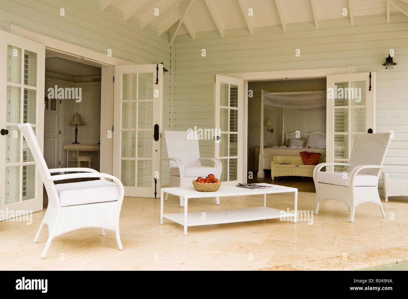 White furniture on patio Stock Photo Alamy