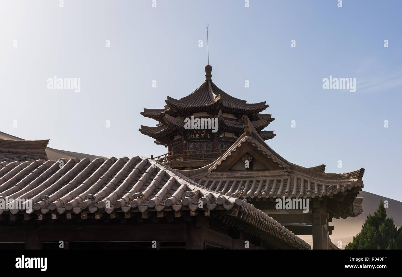 Ancient Chinese wooden pagoda, Crescent Moon Spring, at Dunhuang, Gansu, China Stock Photo