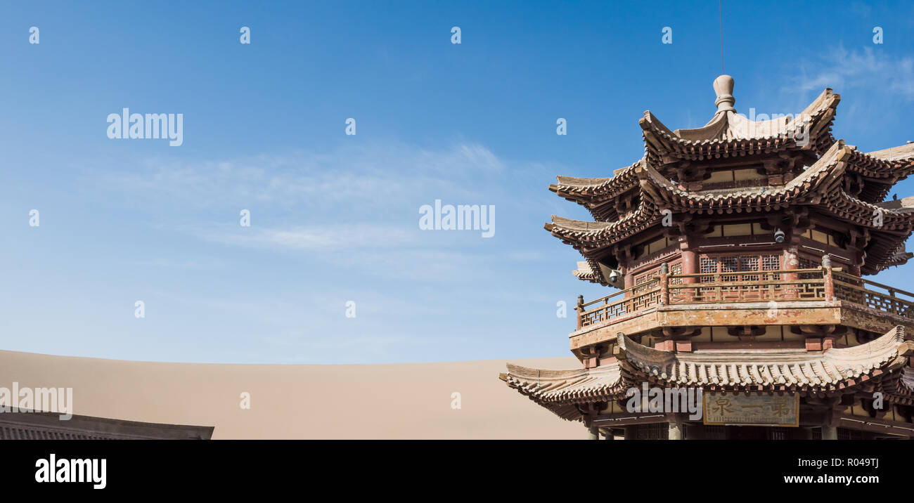 Ancient Chinese wooden pagoda, Crescent Moon Spring, at Dunhuang, Gansu, China Stock Photo