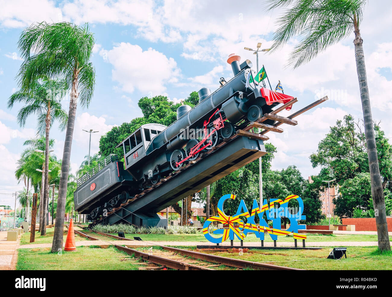 Campo Grande, Brazil - October 29, 2018: Monument of a big black train inclined up to the sky. Memorial Ferroviario (Maria fumaca) at Orla Ferroviaria Stock Photo