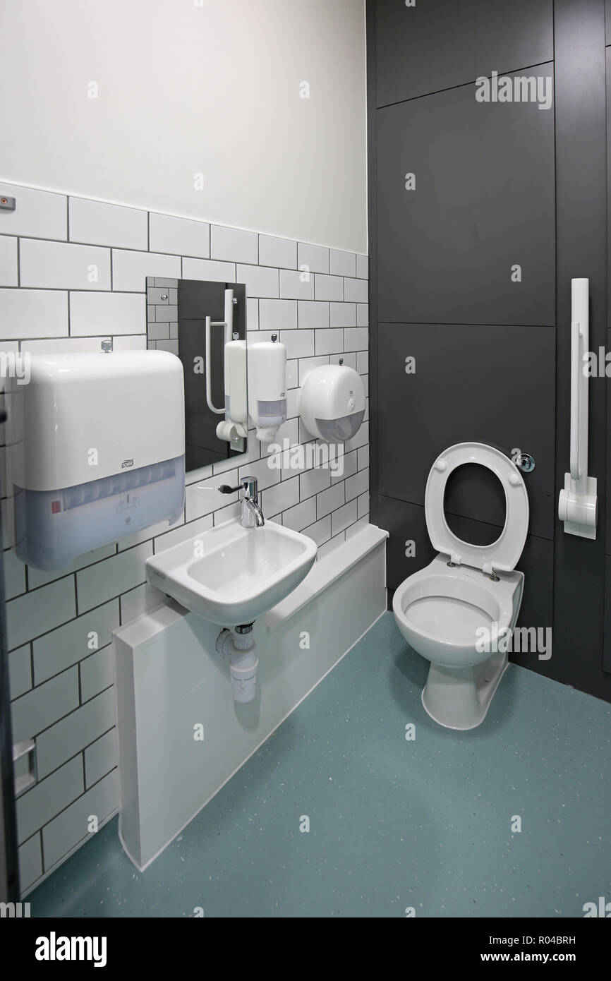 Toilet, washing and hygene room in a brand new special school for children with severe learning difficulties, Southwark, London, UK Stock Photo