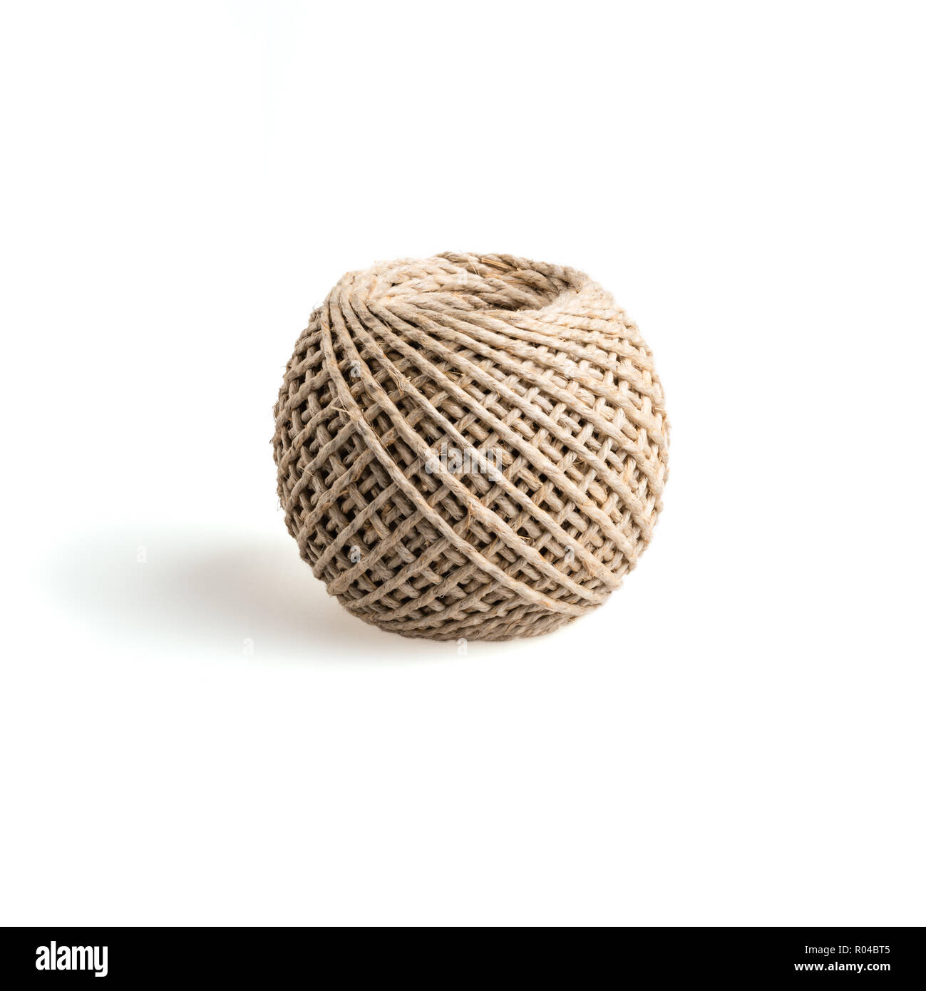 Skein of natural hemp rope isolated on white background. Stock Photo