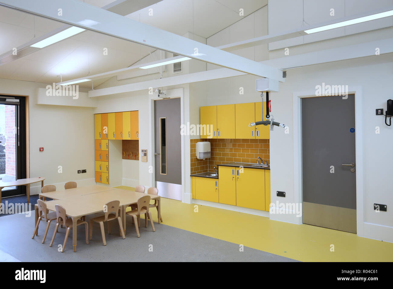 Classroom in a brand new special school for children with severe learning difficulties, Southwark, London, UK. Shows disabled lifting hoist. Stock Photo