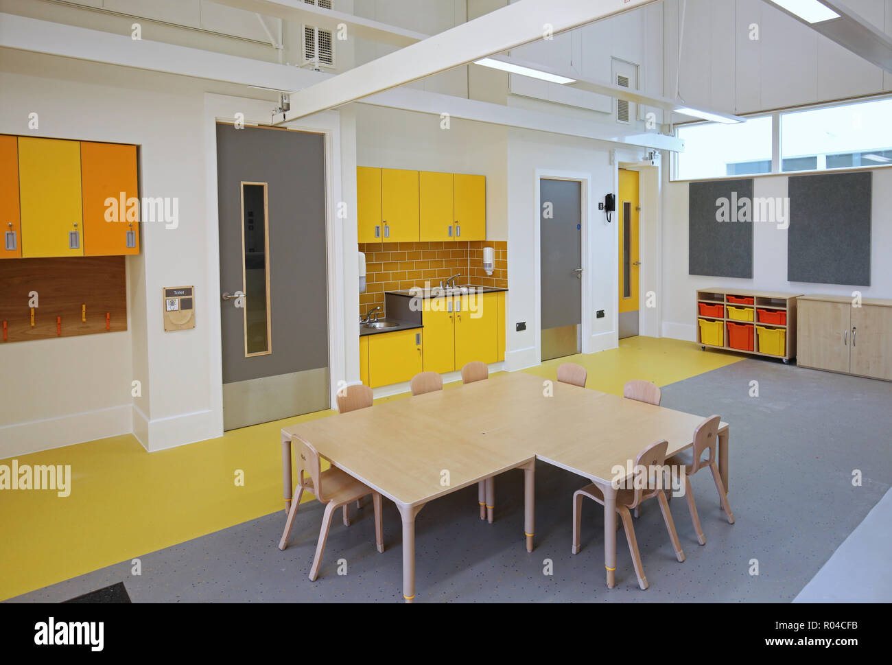 Classroom in a brand new special school for children with severe learning difficulties, Southwark, London, UK. Shows disabled lifting hoist. Stock Photo