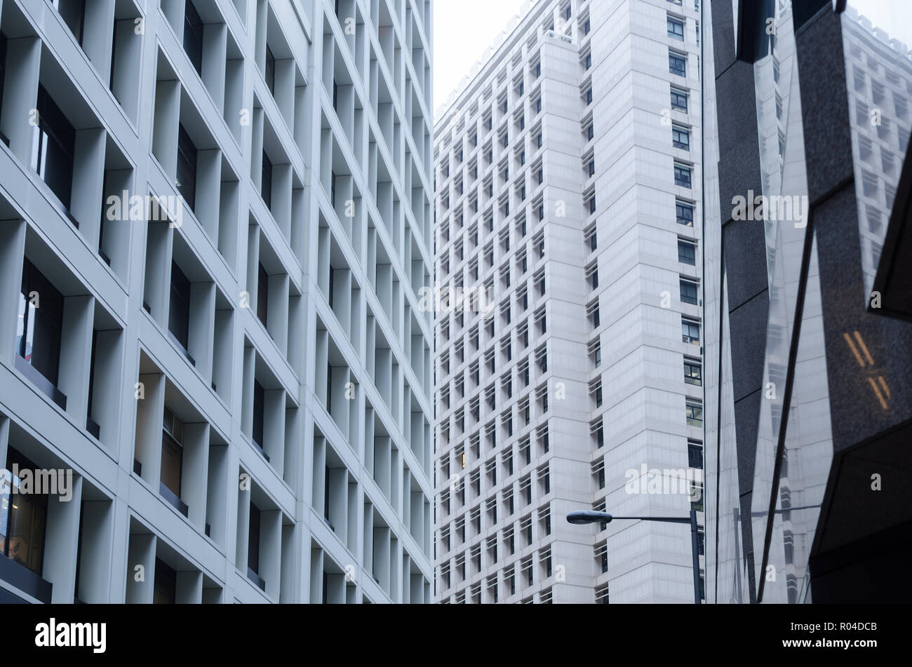 View of concrete office building, urban background, crossing