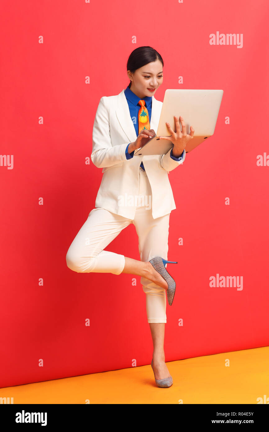 Young women using laptops Stock Photo