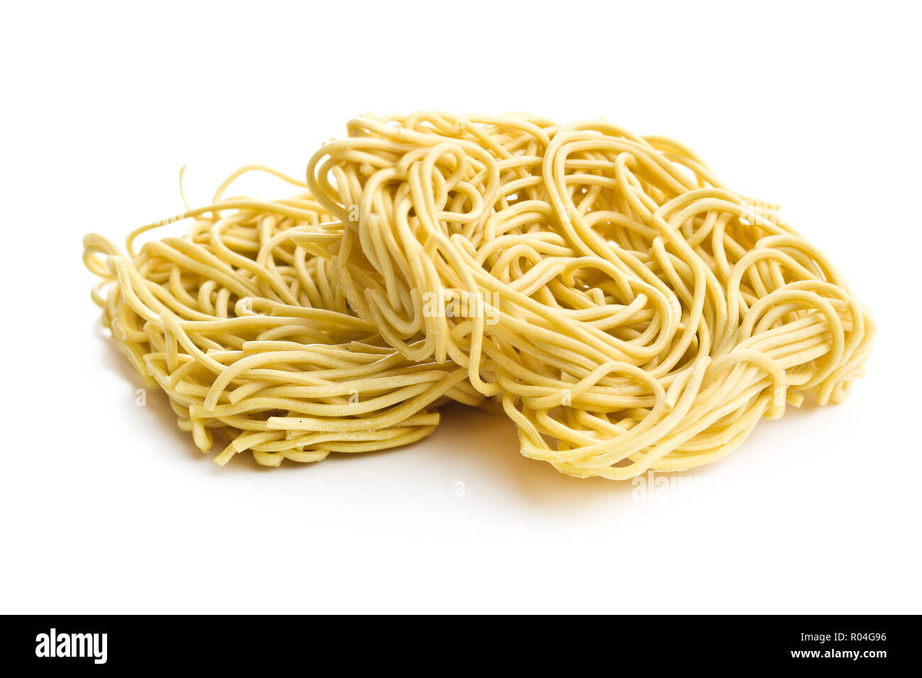 Uncooked instant chinese noodles isolated on white background Stock