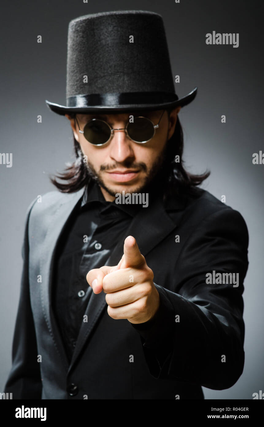 Vintage concept with man wearing black top hat Stock Photo Alamy