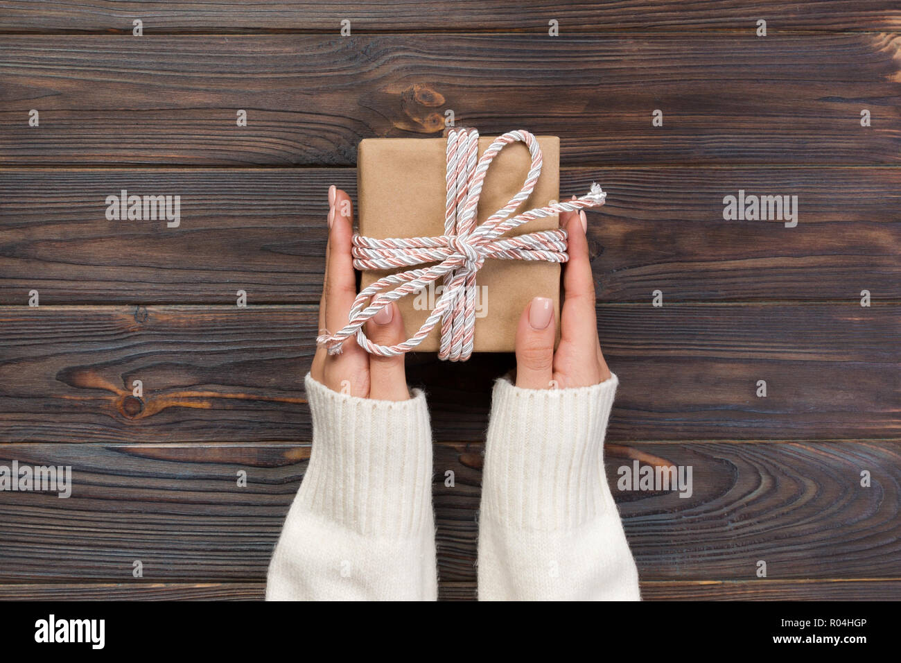 Woman Hands Give Wrapped Valentine Or Other Holiday Handmade