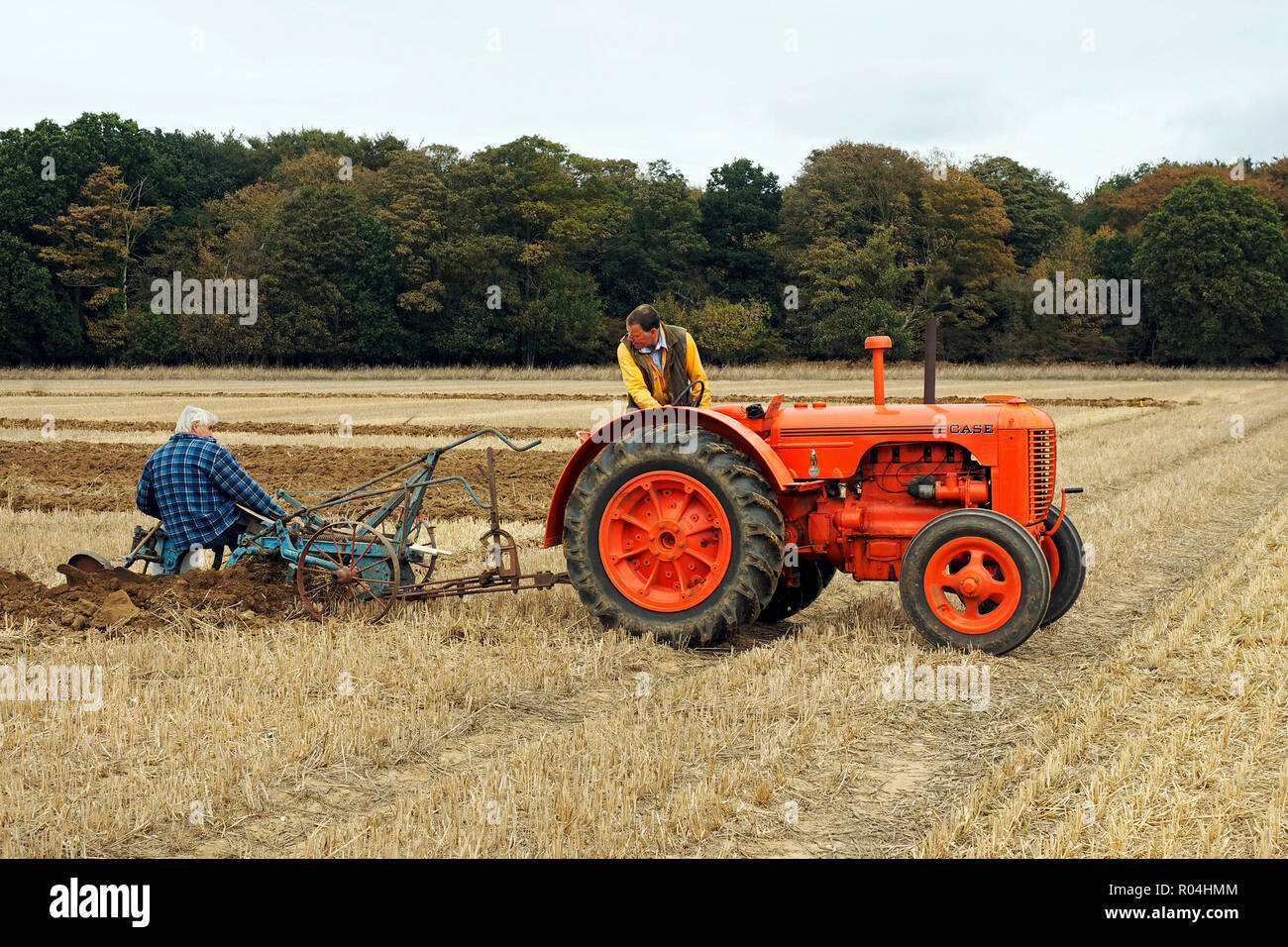 Case Model L tractor paired with a Ransome's plough at a ploughing