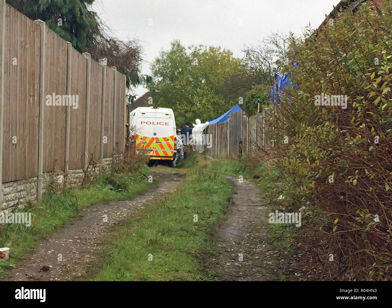 Forensics Officers At The Back Garden Of A Property On Shipton Road In Sutton Coldfield West