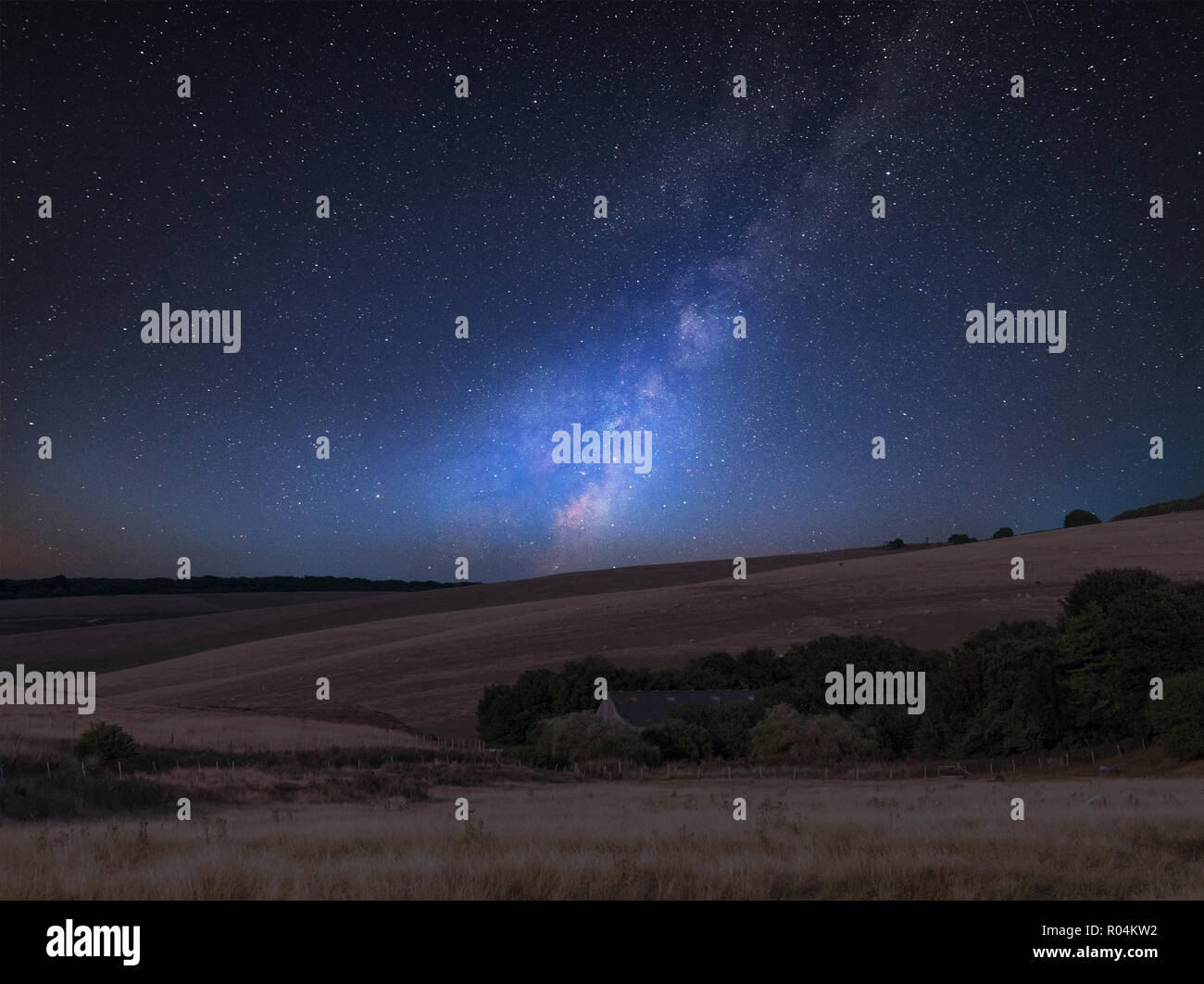 Stunning vibrant Milky Way composite image over landscape of English ...