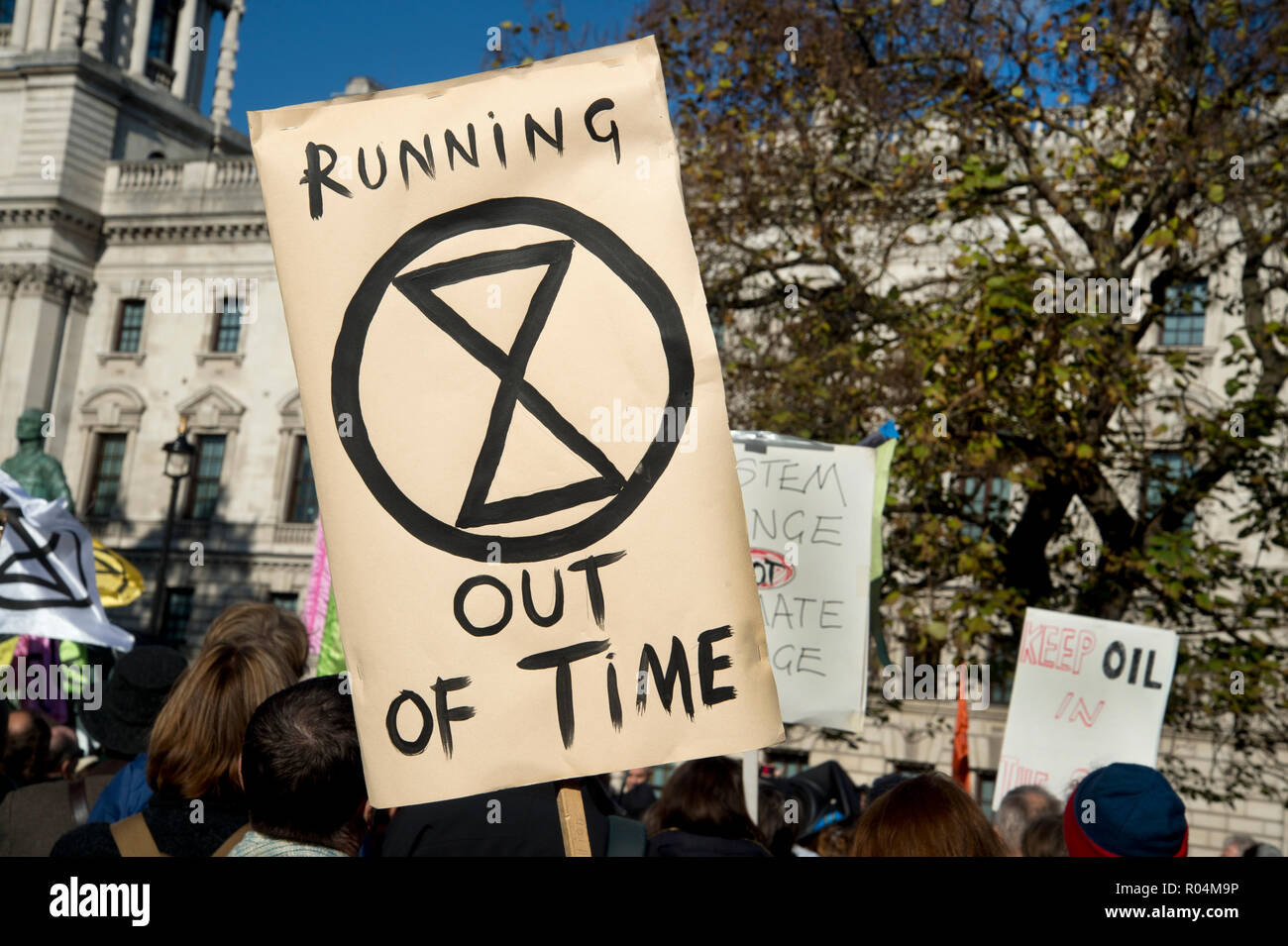 Demonstration in Parliament Square on 31st October 2018 called by Extinction Rebellion to protest the government’s inaction on climate change and call Stock Photo
