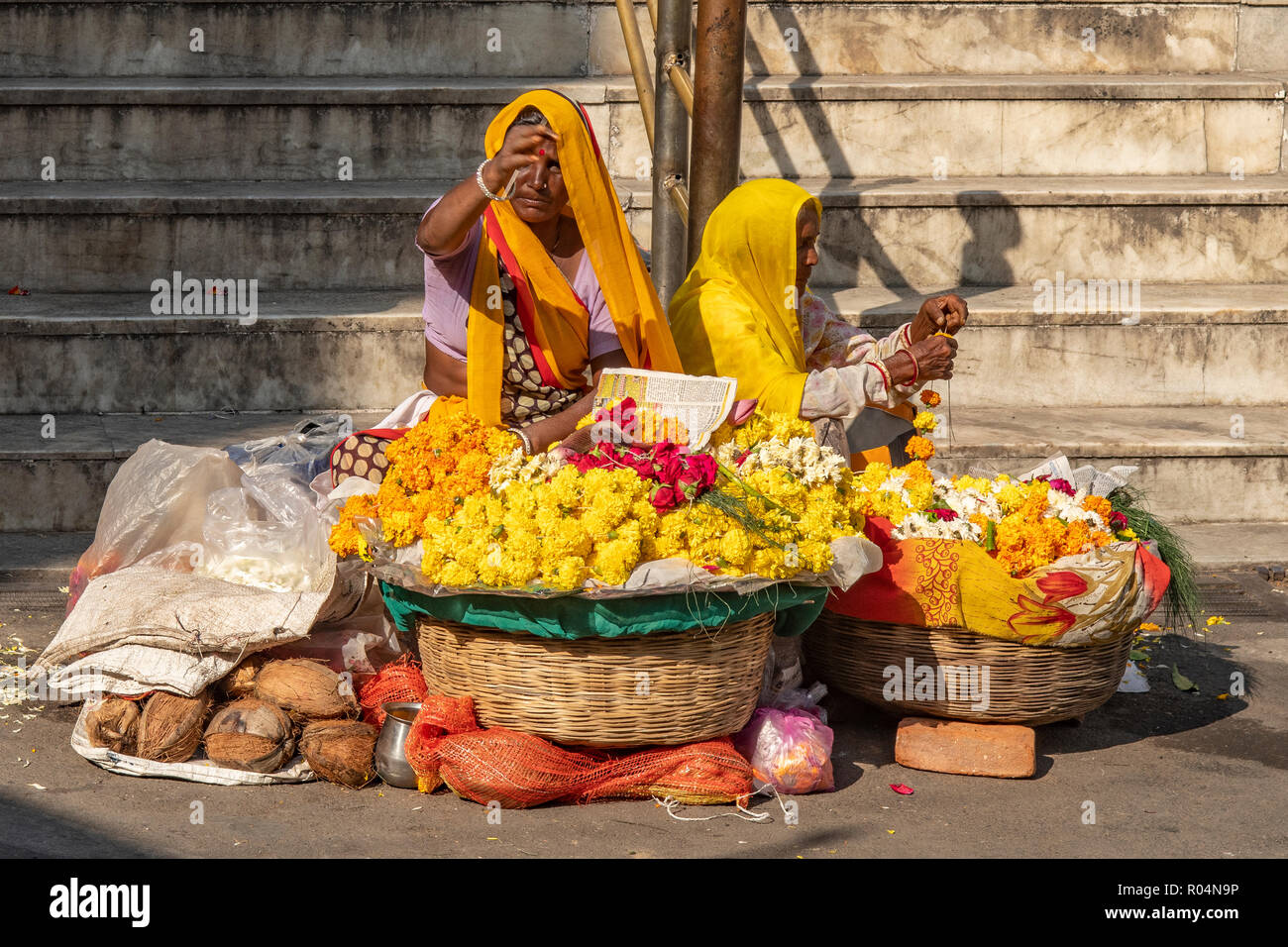 Garland Makers at Jagdish Temple, Udaipur, Rajasthan, India Stock Photo