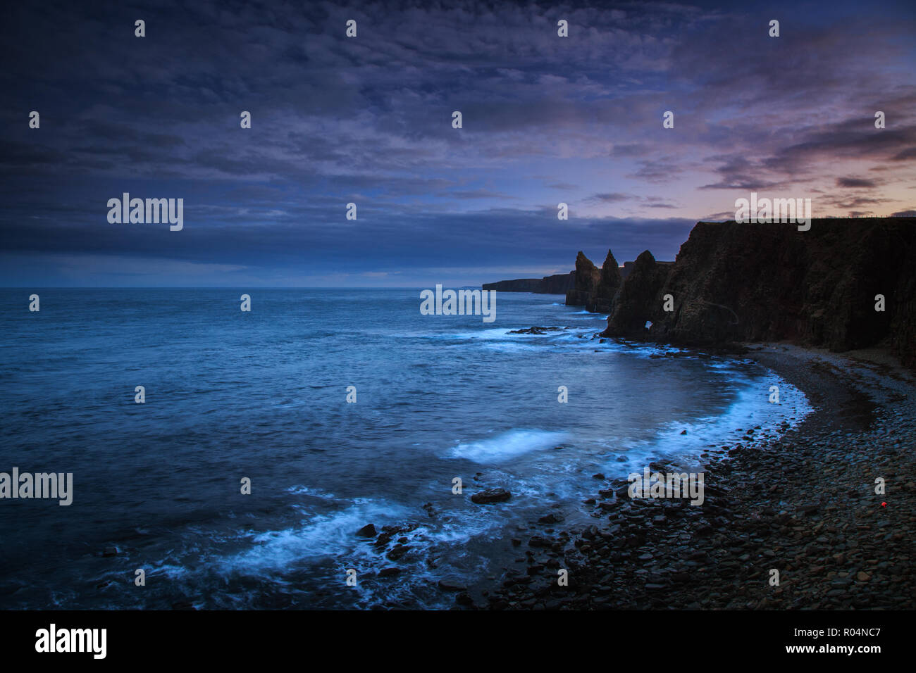 Amazing rock formations called Duncansby Stacks - northern Scotland, John o'Groats area, summer evening trip. Stock Photo