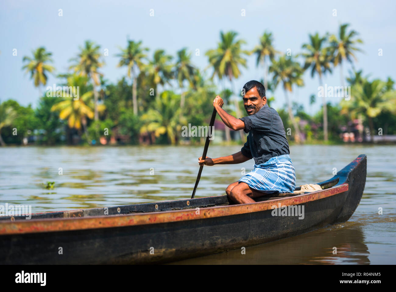 Dugout canoe fishing boat in the backwaters near Alleppey (Alappuzha
