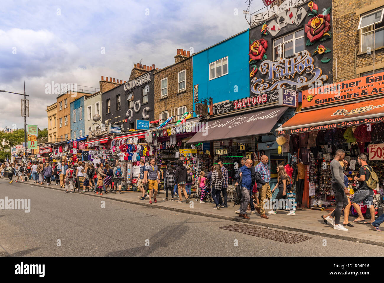 Some of the typically colourful stores on Camden High Street in Camden, London, England, United Kingdom, Europe Stock Photo