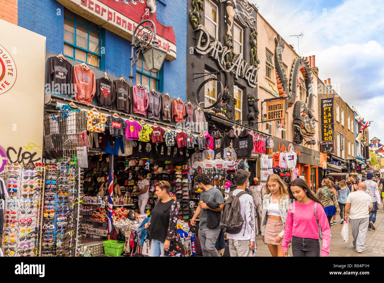 Some of the typically colourful stores on Camden High Street in Camden, London, England, United Kingdom, Europe Stock Photo