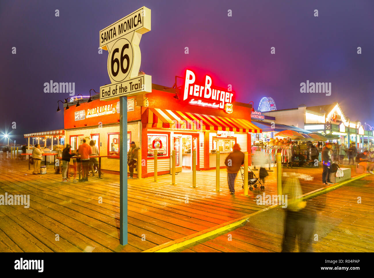 View of shops and Route 66 End of Trail sign on Santa Monica Pier, Santa Monica, Los Angeles, California, United States of America, North America Stock Photo