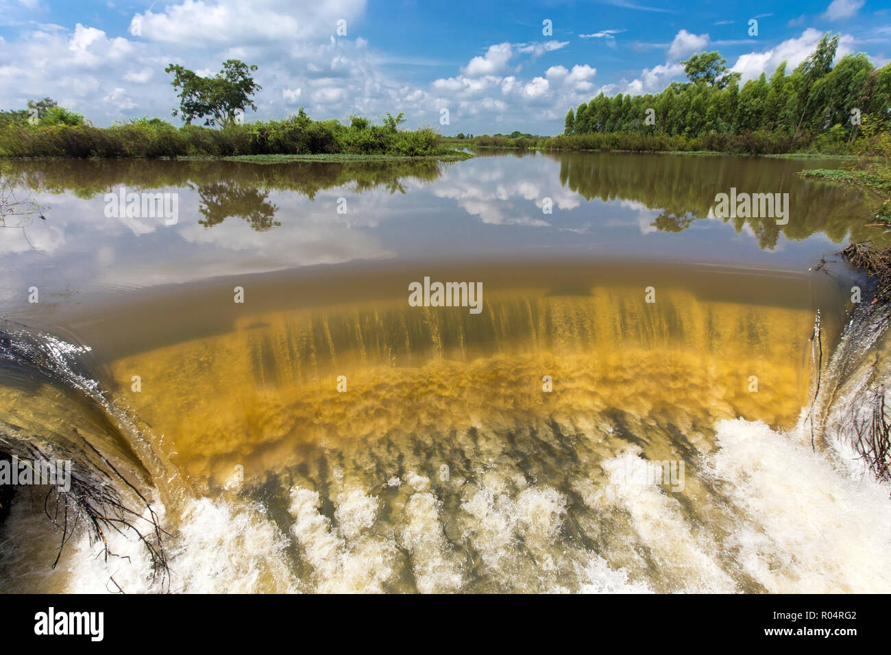 River flowing during tropical monsoon in the Buriram province, Thailand Stock Photo