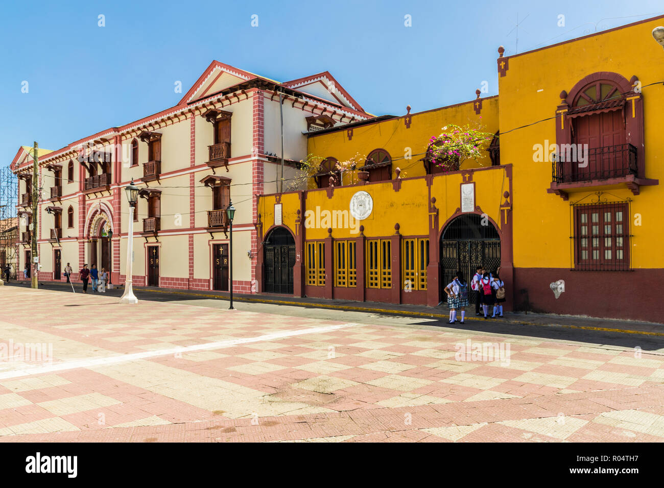 The colourful facade of the College of Ramon by Central Park, Leon, Nicaragua, Central America Stock Photo
