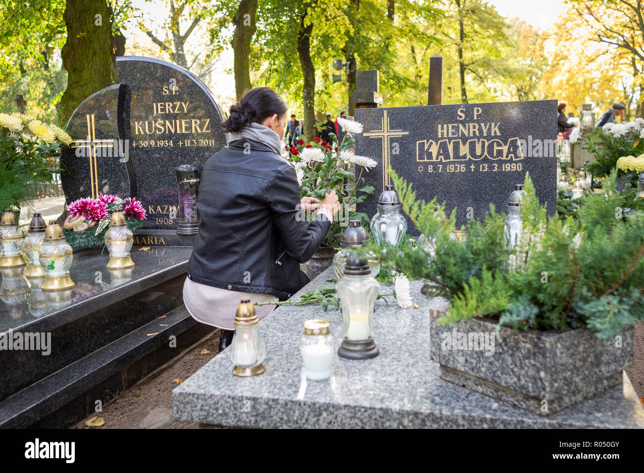 Szamotuly, Poland, 1 November 2018. All Saints Day are a festival when Christians visit cemeteries to decorate the graves of their relatives with flowers and light candles. In the Latin Churches, a solemnity in honor of all Christians who have reached the state of salvation and are in heaven, falling annually on November 1. Credit: Slawomir Kowalewski/Alamy Live News Stock Photo