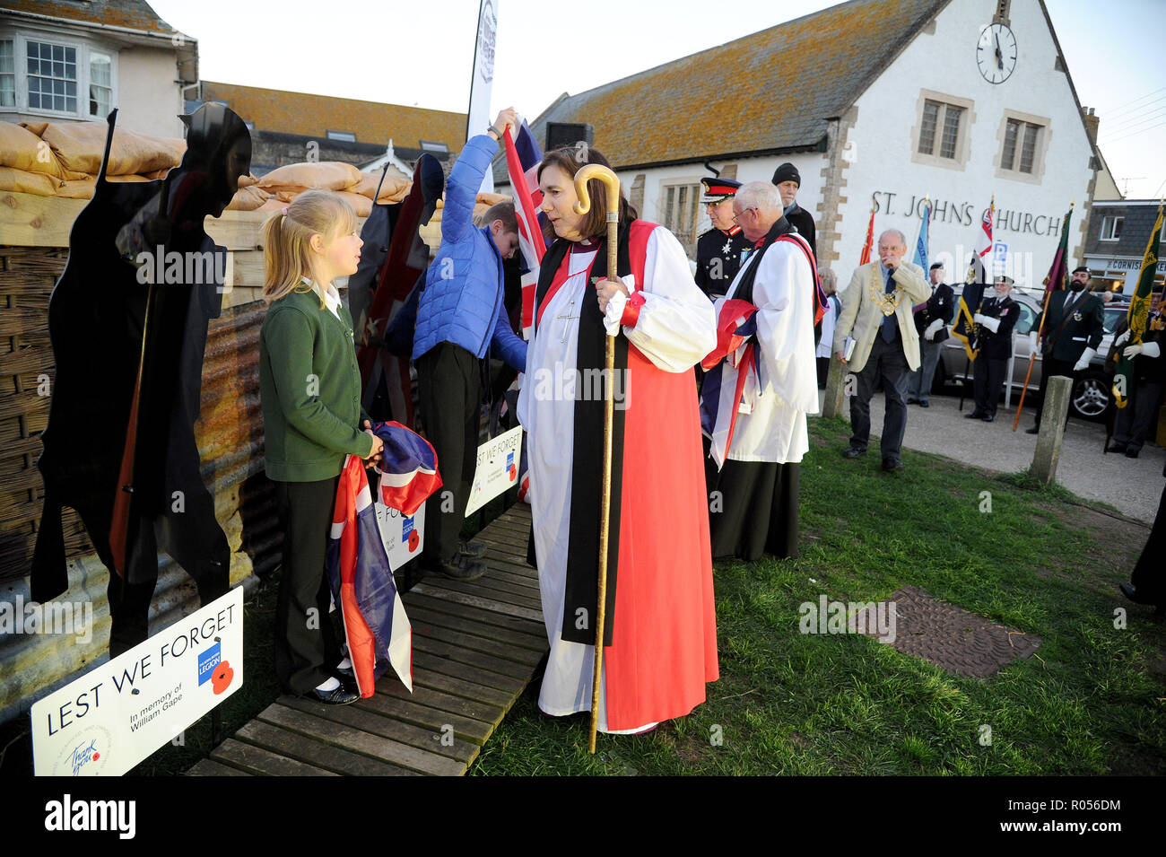 West Bay, Dorset, UK. 1st November, 2018. Six silent soldiers unveiled by six children to honour the lives of six local West Bay men who lost their lives in the First World War. The life-sized statues on display at Harbour Green in West Bay honour local men - Robert Buckler, William Gape, Herbert Gush, Richard Glare, Frederick Hoskins and Alfred Oliver. Credit: Finnbarr Webster/Alamy Live News Stock Photo