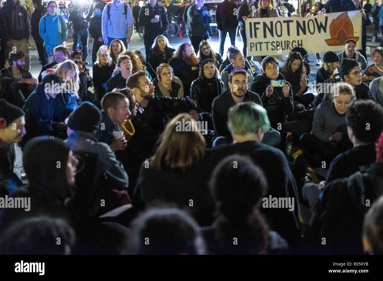 Pittsburgh, PA, USA. 30th Oct, 2018. Crowd seen during the If Not Now When demonstration.In the aftermath of the Tree of Life shootings in Pittsburgh, PA, the If Not Now When protest sits in the middle of the main street in squirrel Hill, police block off roads. Credit: Aaron Jackendoff/SOPA Images/ZUMA Wire/Alamy Live News Stock Photo