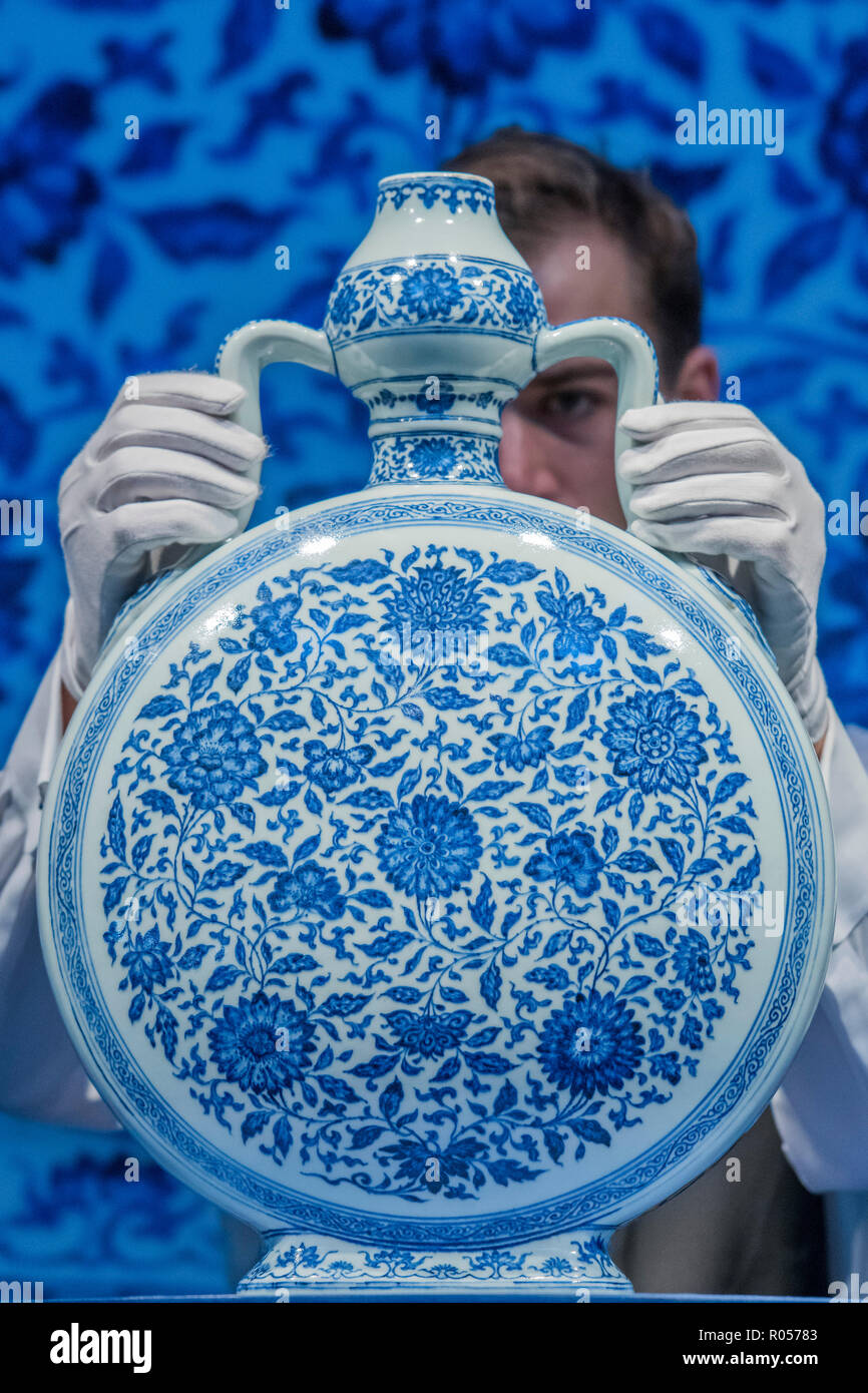 London, UK. 2nd November, 2018. A Rare Large Ming-Style Blue and White Moonflask, Bianhu, Yongzheng six-character seal mark in underglaze blue and of the period (1725-1735), Estimate on request but expected to achieve ove £1m - Christie’s Fine Chinese Ceramics & Works of Art auction preview. The works will be on view and open to the public from 2 to 5 November. Credit: Guy Bell/Alamy Live News Stock Photo