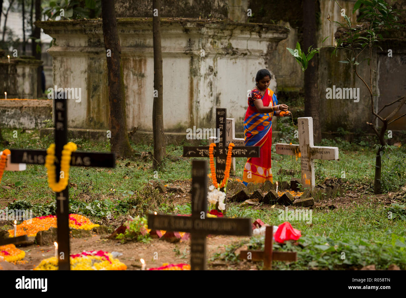 Dhaka, Bangladesh. 2nd Nov 2018.  Christian devotees observe All Souls' Day, known as the Feast of All Souls, Commemoration of all the Faithful Departed in Dhaka , Bangladesh on November 02, 2018.  On this day, Christians come to the graveyard and pray for the departed souls of their loved ones..All Soul's Day is a Roman Catholic day of remembrance for friends and loved ones who have passed away. Credit: zakir hossain chowdhury zakir/Alamy Live News Stock Photo