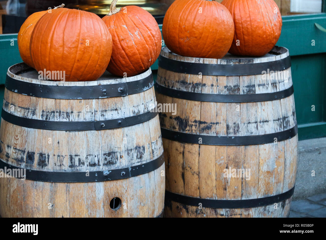 Barrels and orange pumpkins infront of the Cafe Var at Buda Castle. Budapest, Hungary. Stock Photo